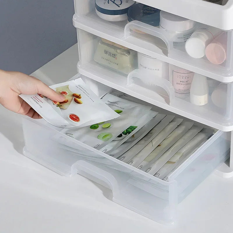 AuraNest plastic cosmetic storage box with multiple compartments for organizing makeup and beauty products.
