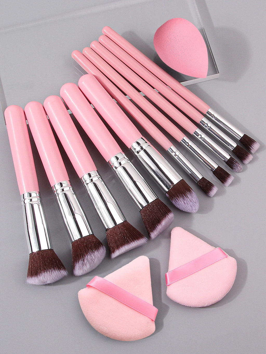 AuraNest high-grade pink makeup brush set with professional makeup tools, featuring various brush shapes and sizes for beauty routines.