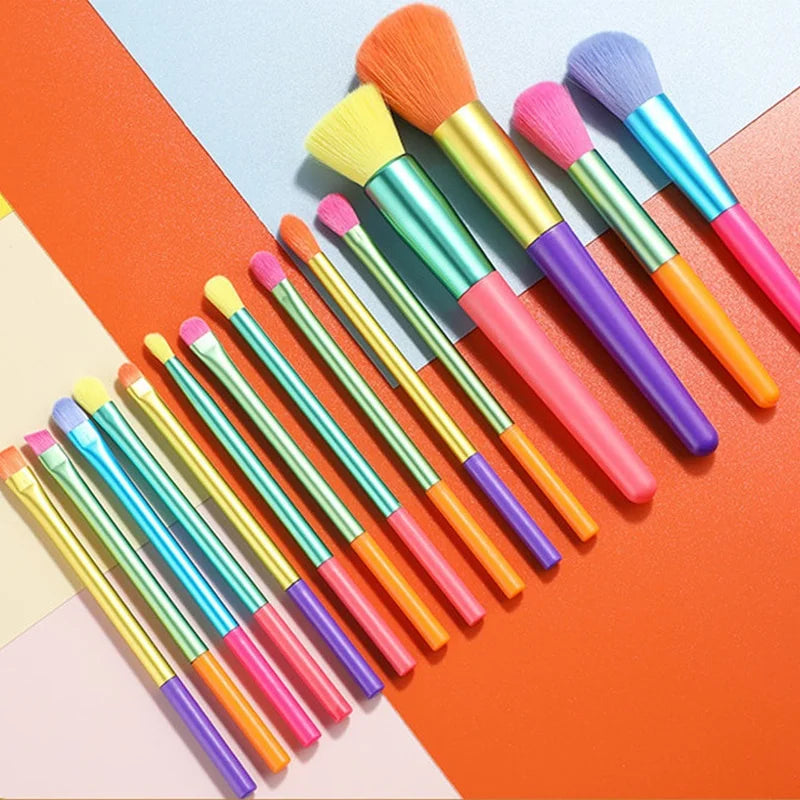 Set of 15 colorful makeup brushes by AuraNest, featuring various brush types for blending, contouring, and applying makeup.